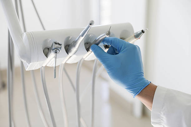 Professional Tooth Extraction technician working in Brown City, MI